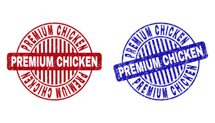 Grunge PREMIUM CHICKEN round stamp seals isolated on a white background. Round seals with grunge texture in red and blue colors.