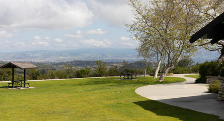 Aliso & Woods Canyon Wilderness trail in the spring after a rainy season, Laguna Beach, CA hiking trails. Rest area