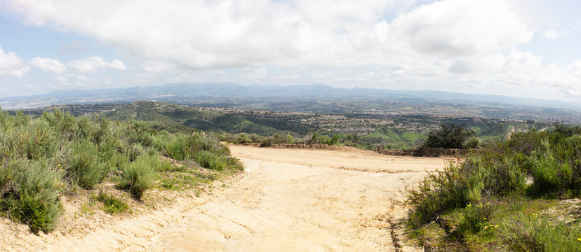 People hiking at Aliso & Woods Canyon Wilderness trail in the spring after a rainy season, Laguna Beach, CA hiking trails.