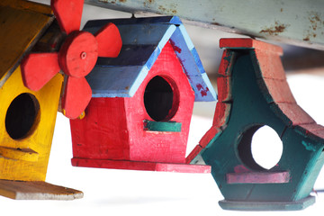 colorful wooden bird house background.