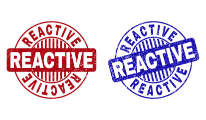 Grunge REACTIVE round stamp seals isolated on a white background. Round seals with grunge texture in red and blue colors. Vector rubber imitation of REACTIVE tag inside circle form with stripes.