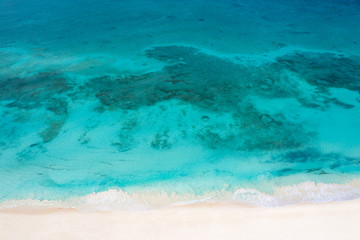 Aerial view on tropical island with turquoise caribbean sea