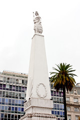 Obraz premium May Pyramid and Economy Ministry on the Buenos Aires city. Pirámide de Mayo y Ministerio de economía de la ciudad de Buenos Aires