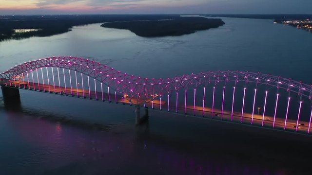 Aerial Zoom In of the Hernando de Soto Memphis Bridge Lights at Dusk