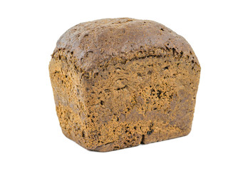 A loaf of dark bread from coarse flour isolated on a white background.