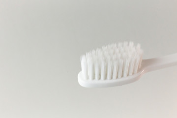 A Toothbrush on white background close up image.