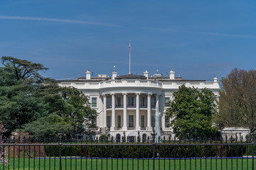 White House with blue sky in Washington DC, USA