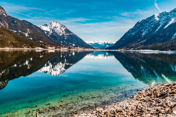Fototapeta na wymiar Beautiful alpine winter view with reflections at the Achensee-Pertisau-Tyrol-Austria