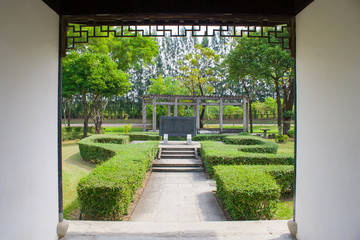 Tropical view of Chinese garden in public park.