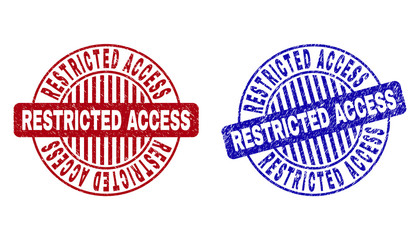 Grunge RESTRICTED ACCESS round stamp seals isolated on a white background. Round seals with distress texture in red and blue colors.