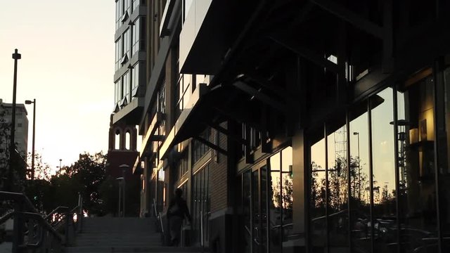 Mutual of Omaha&rsquo;s Midtown Crossing at Turner Park shopper walking past stores