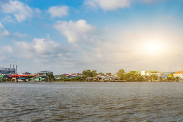 Fototapeta premium Tropical lake with local house