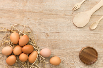 Eggs for cooking on wood background top view.Flat lay.