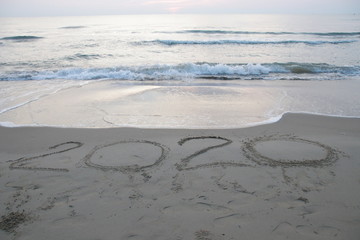 2020 foot print on the sand