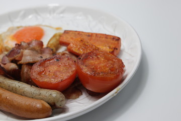 Continental Breakfast, Sausage, Bacon,Egg, Tomatoes and Carrot