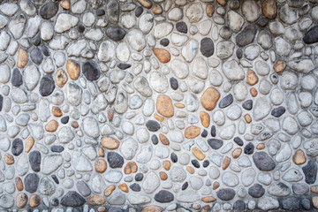 Wall made of gravel and cement. Backgrounds, Textures