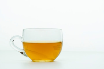 Cup of tea on white background