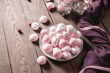 Small crunchy meringues on rusti background