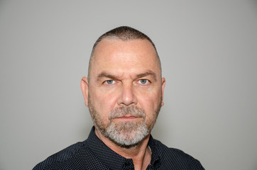 Intense determined man staring at the camera
