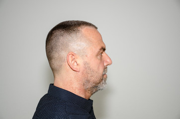 Obraz premium Profile portrait of a man with short haircut