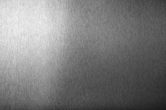 Silver metal shiny empty surface, monochrome shining metallic background, brushed black and white  iron sheet backdrop close up, smooth dark gray steel texture, art grunge design element, copy space