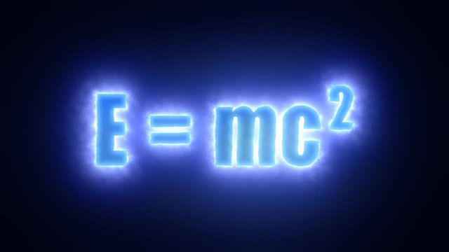 The text E = mc2 (equation formula of the mass - energy equivalence), surrounded by an energetic cloud of electricity. Blue tones, black background.