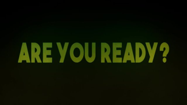 A rising cloud of toxic green gas, revealing the text Are you ready?, appearing from the darkness with an ominous glow.