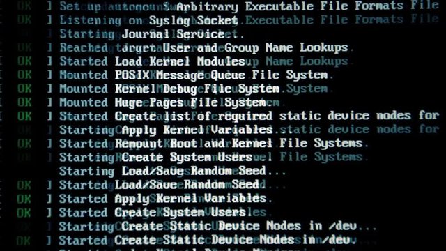 Mashup sequence of a computer screen while booting an open source operating system.