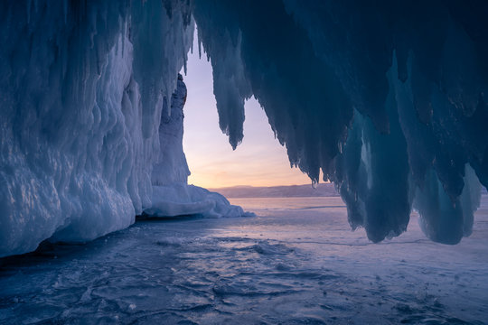 Ice cave in Baikal lake in winter season at sunset, Russia, Siberia