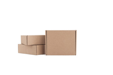 Stack of craft paper boxes isolated on white.