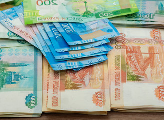 paper banknotes of two hundred rubles one thousand, two and five thousand rubles of the Russian...