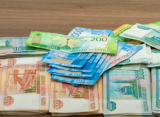 paper banknotes of two hundred rubles one thousand, two and five thousand rubles of the Russian Federation