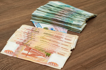 paper banknotes of two hundred rubles one thousand, two and five thousand rubles of the Russian...