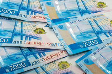 paper banknotes of two hundred rubles two and five thousand rubles of the Russian Federation