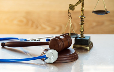 Law and Justice concept. Gavel and stethoscope