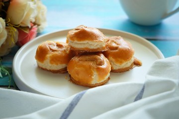 Close up of Singapore cookie on white plate.