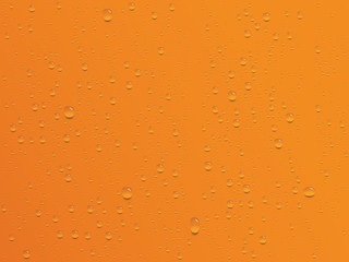 realistic water drops on orange background
