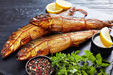 hot smoked whole herrings with lemon slices