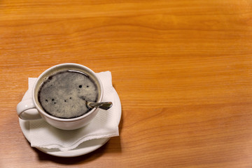 Obraz premium Cup of coffee on a saucer