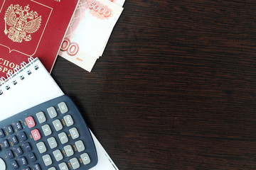 Russian passport and currency business and travel concept
