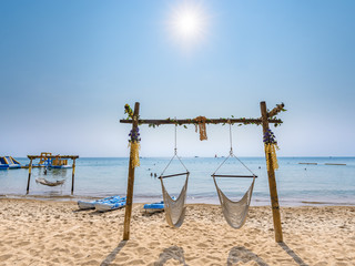 The elegant swings on the sea beach