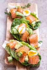 Lettuce wrapped smoked salmon tacos with fresh cucumber, avocado and eggs