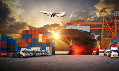 Logistics and transportaIndustrial Container Cargo freight ship, forklift handling container box...