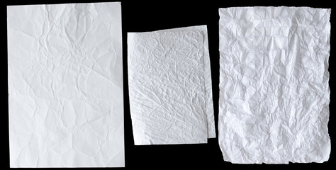 A CRUMPLED PIECE OF PAPER ON A BLACK BACKGROUND
