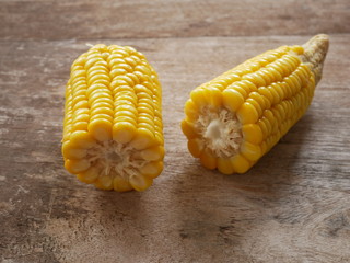 sweet corn on the wood background
