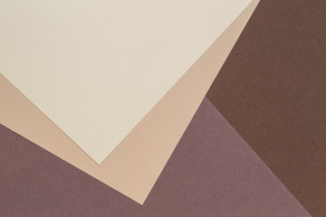 Color papers geometry composition background with beige and brown color tones