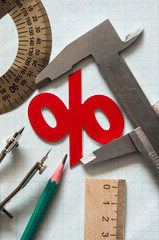 Set of drawing instrument and rulers on graph paper