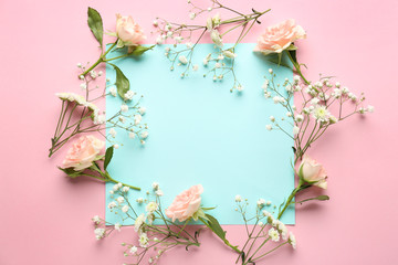 Empty sheet of paper with beautiful flowers on color background