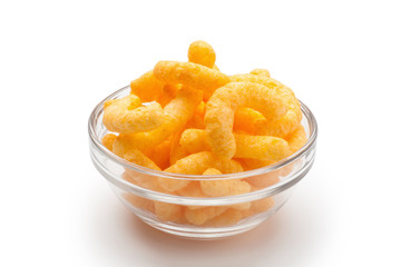 Cheese puffs in a glass bowl, Isolated on a white background