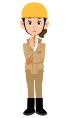 考える建築現場作業員の女性　ベージュ色の作業着